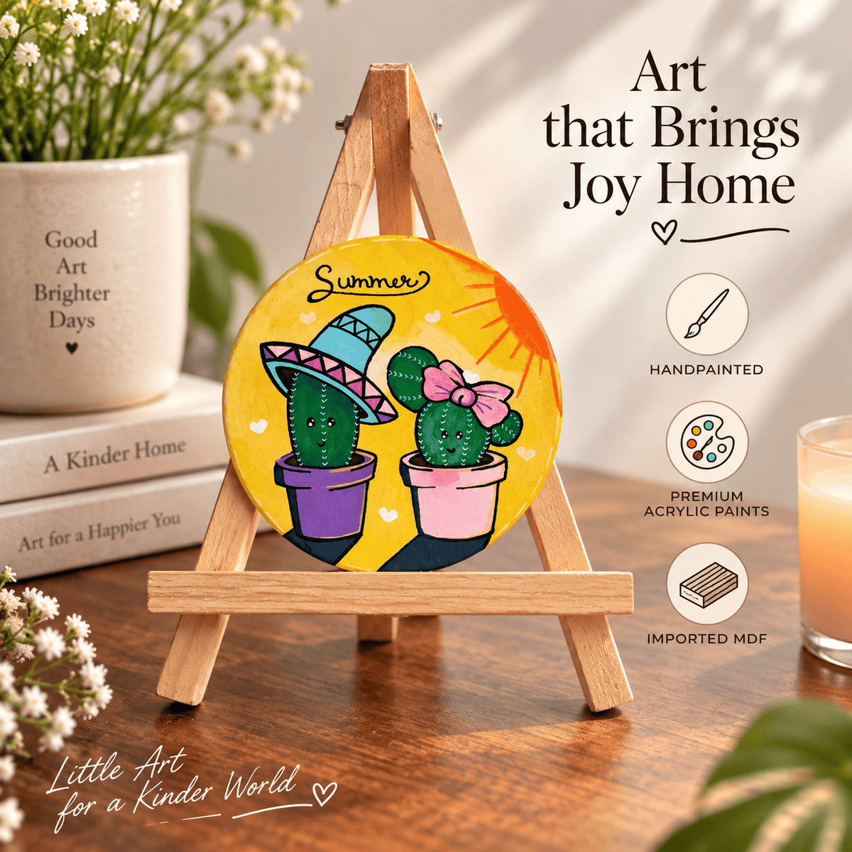 A round hand-painted acrylic art piece displayed on a small wooden easel. The artwork features two cacti in colorful pots against a bright yellow sun and sky.